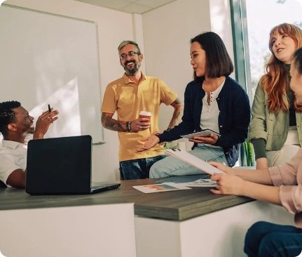 An office workplace where people are talking